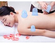 Un massaggiatore facciale foggiante a coppa di 4 dei pc barattoli dell'anti delle celluliti della tazza silicone molle medico delle tazze